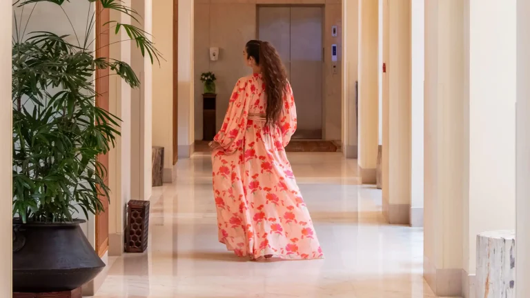 ZNZPH-P0334-Woman-Walking-Hallway